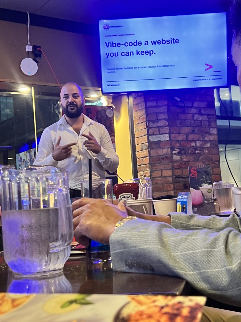 Baljinder Singh presenting WPadmin.AI and website ownership at AI Tech & Startup Night in Toronto.